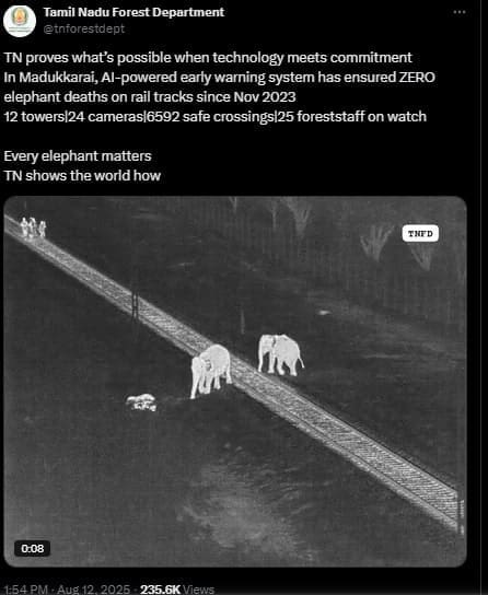 Infrared camera footage showing elephants safely crossing a railway track at night.